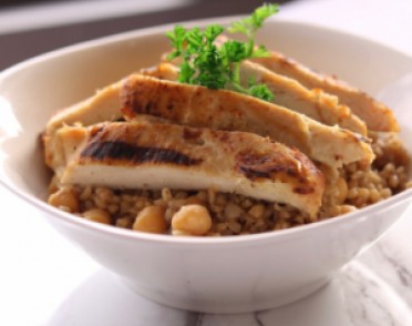 Mediterranean grill chicken with rice topped with garlic sauce