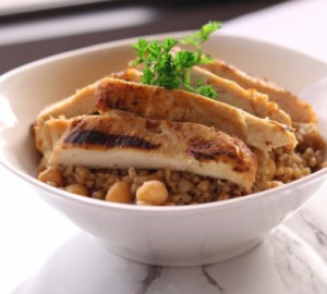 Mediterranean grill chicken with rice topped with garlic sauce
